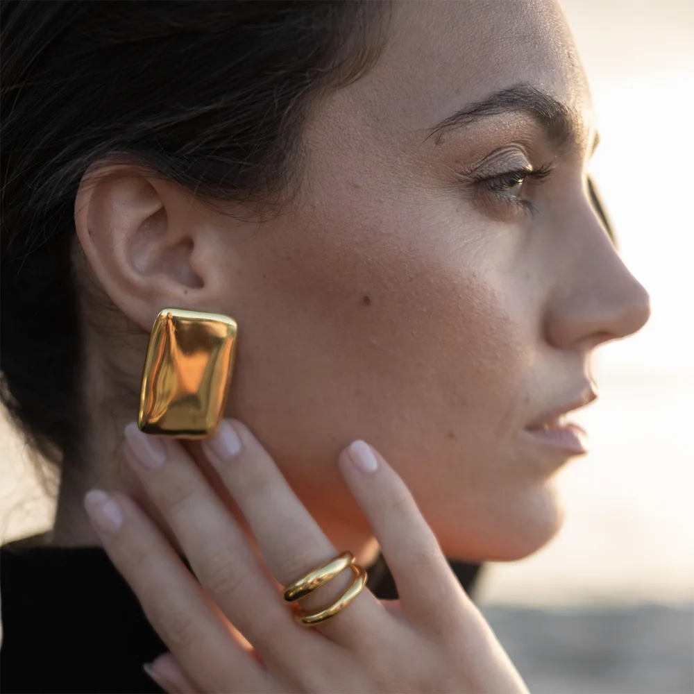 Stylish stainless steel gold-plated rectangular earrings with a minimalist design and waterproof feature.