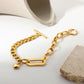 Add a touch of elegance to your jewelry collection with our stunning Oval Link Chain Bracelet with Heart Charm Dangle, expertly crafted by Camco Jewelry. The sleek and modern design is perfect for both casual and formal occasions, and the high-quality materials ensure long-lasting wear and comfort. The heart charm dangle adds a touch of whimsy and romance to this timeless piece. Order now and elevate your style game with this chic and versatile accessory