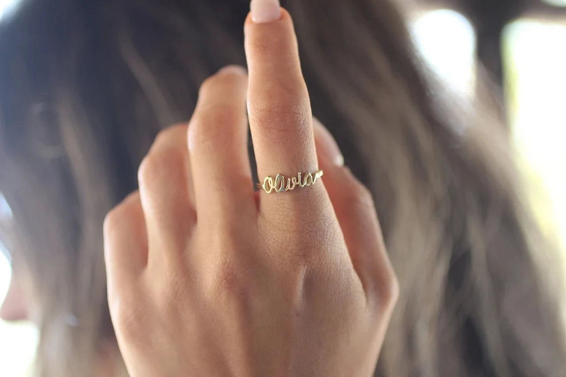 A close-up view of the exquisite Stainless Steel Name Ring, showcasing personalized initials, adding a touch of sophistication to any ensemble.