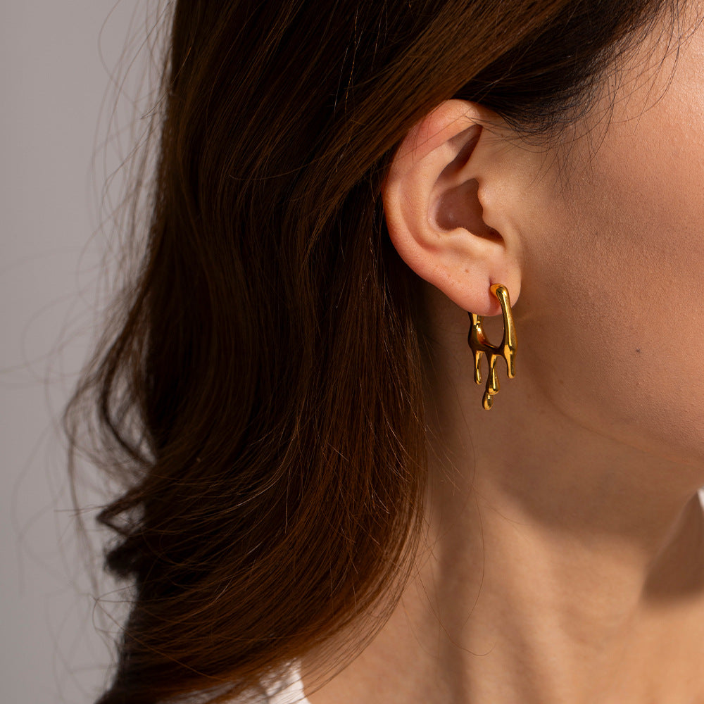 Close-up view of Popular 18K Gold Stainless Steel Liquid Gold Earrings, showcasing a fluid and opulent design for a timeless and sophisticated look.