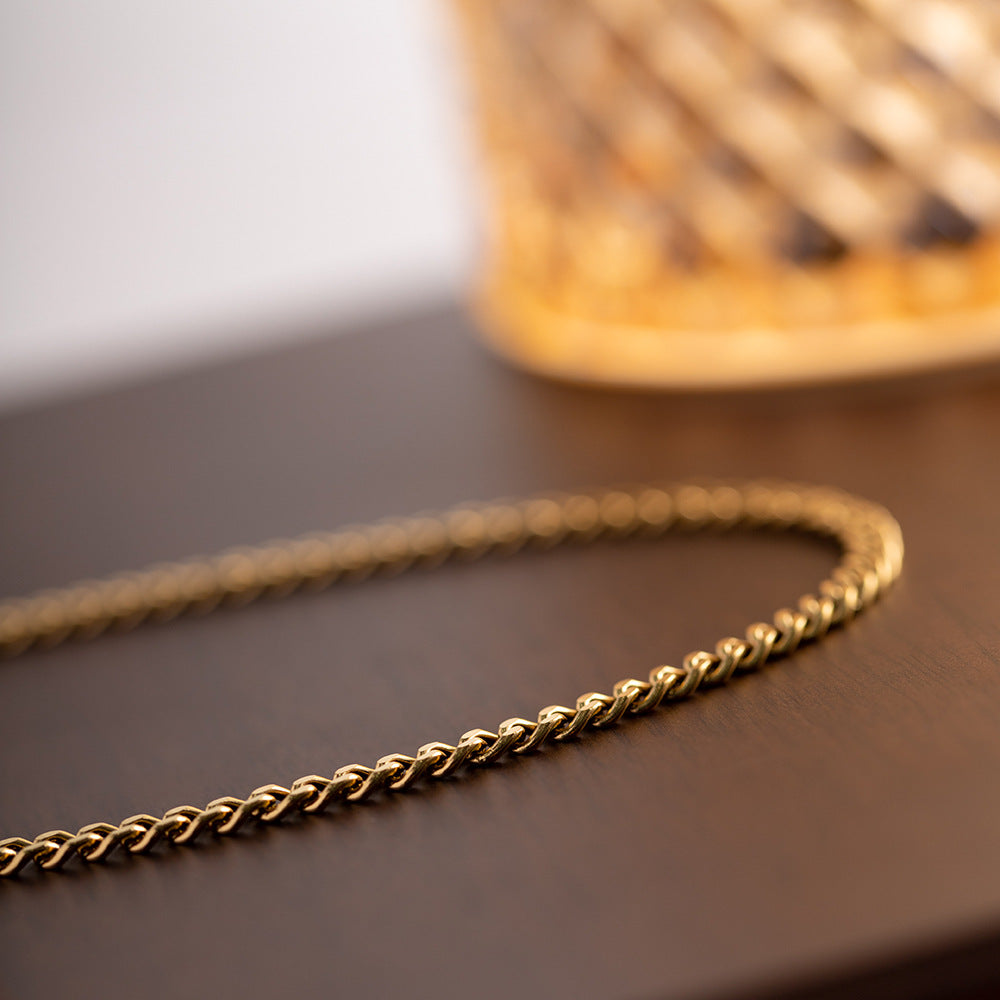 Gold-plated stainless steel thick Cuban chain, a bold and timeless accessory for a touch of opulence and enduring style.