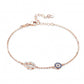 Sterling silver bracelet featuring a Blue Evil Eye Hamsa Hand charm adorned with Cubic Zirconia accents for a stylish and protective accessory