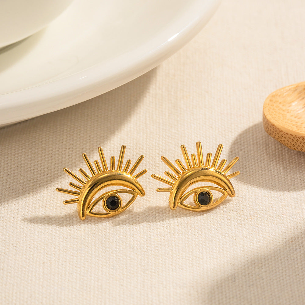 Close-up view of Devil's Eye Design Stud Earrings in 18K Gold-Plated Stainless Steel with Zirconia detailing, showcasing delicate vintage charm and intricate craftsmanship