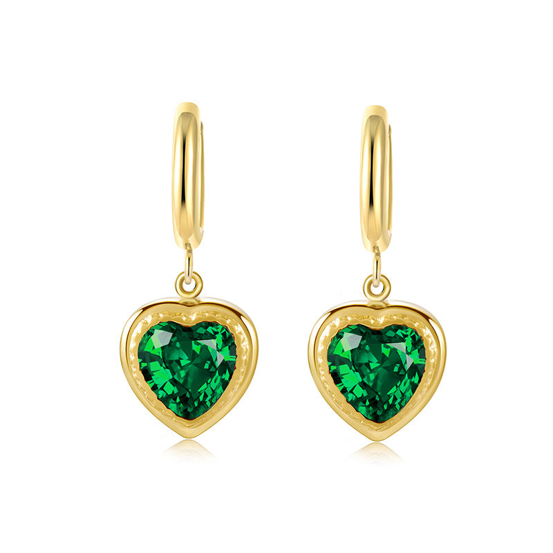 Stainless steel ear clips featuring emerald zircon peach hearts with 18K real gold plating for a touch of timeless elegance.