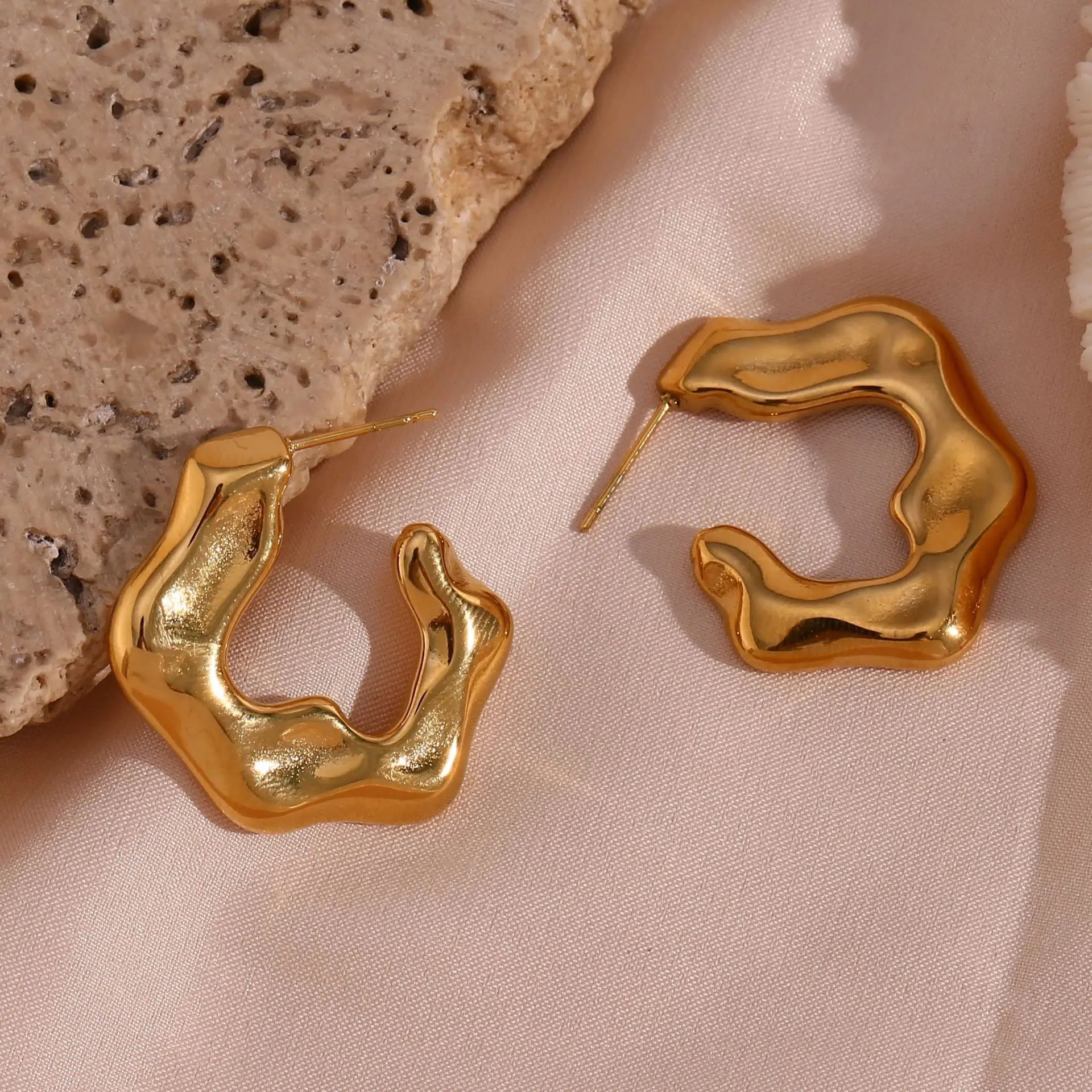 Chunky C-shaped abstract flower stud earrings stainless steel design