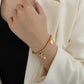 Stainless Steel Gold-Plated Bracelet: A blend of durability and timeless elegance, perfect for adding a touch of radiant charm to any ensemble