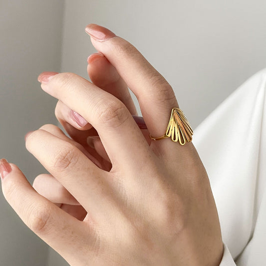 Stainless steel peacock gold ring, a regal and timeless accessory with intricate design for a touch of elegance.