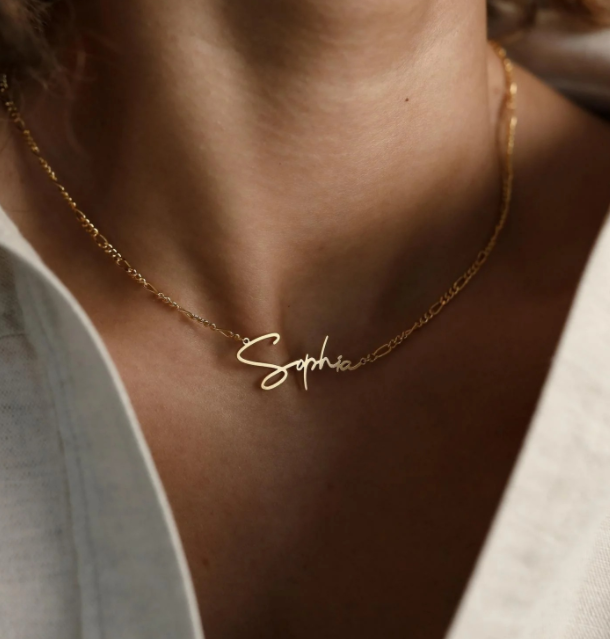 Elevate your style with our Custom Name Necklace featuring a chic Figaro chain—a timeless and personalized accessory that adds a touch of elegance to your look.