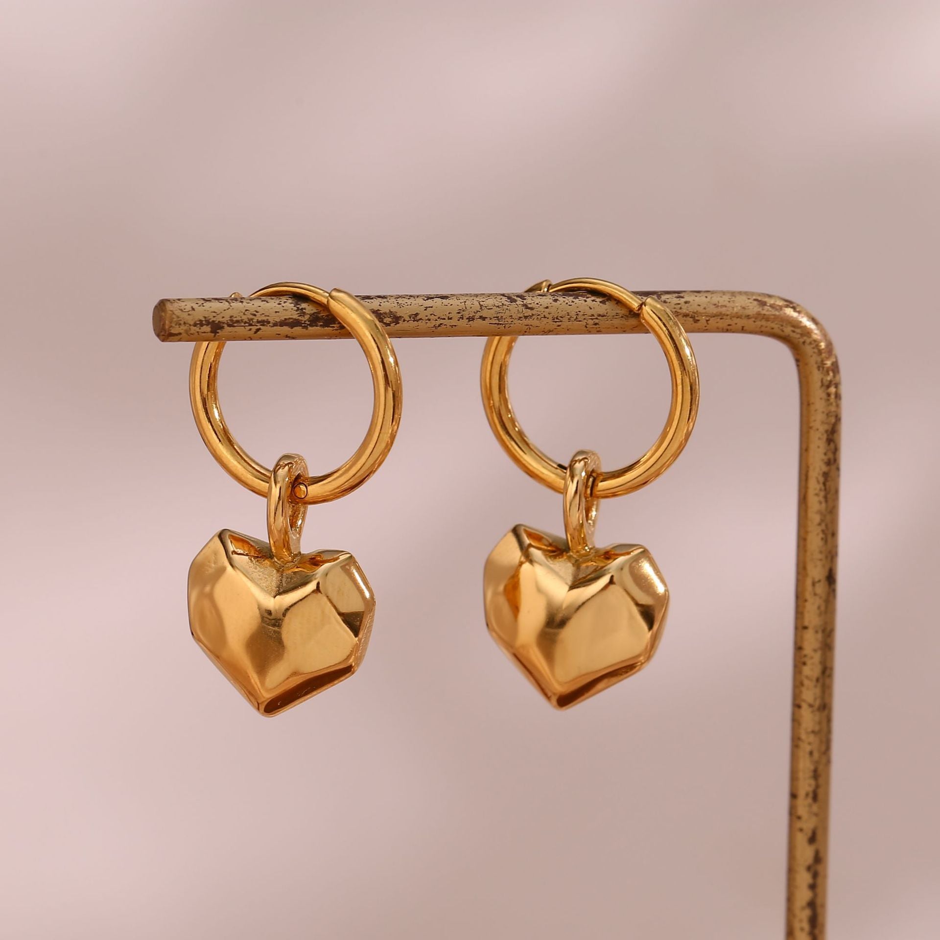 Chic and timeless Love Pendant Earrings crafted from durable stainless steel for a touch of enduring elegance.