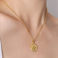 Simple necklace with three dimensional wings round coin pendant