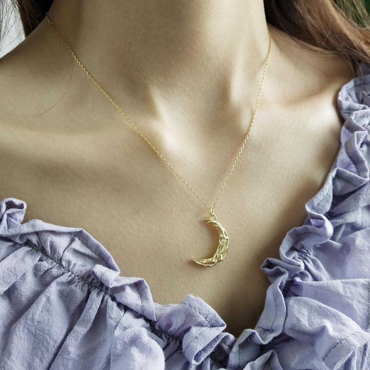 Pleated rippled moon necklace