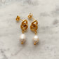 Stylish freshwater pearl earrings in a unique baroque shape. Elegant and versatile, these pearl earrings are perfect for any occasion. Made with high-quality materials for comfortable and long-lasting wear.