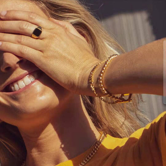 Women’s fashion jewelry gold plated stainless steel sleek ring