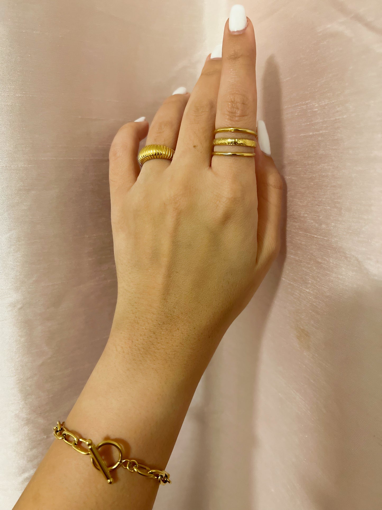 Minimalistic 18k gold ring for women with a simple yet elegant design